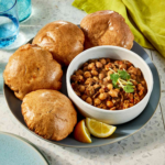 Cholle Poori (Spiced Chickpeas with Puffed Fried Bread)